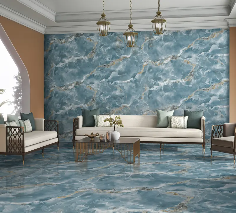 Soggiorno con pavimento e parete in ceramica di Sassuolo effetto onice blu